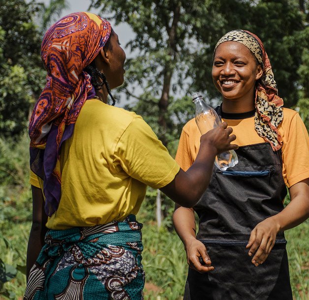 Women farmers smiling